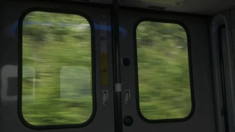 Train Doors Interior View With Fast Moving Landscape Stock Footage 334854497