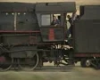 Train driver and people looking out of train window viewed from outside SD Footage