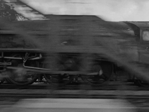 Train driver and steam engine crew at work, UK 1954 스톡 동영상 133275770