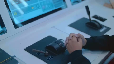 A train driver apprentice learns using a modern electronic simulator Video stock 323916755