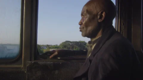 Train driver driving the train in the cab DaresSalaam Tanzania Vídeo Stock 132458529