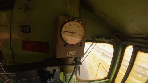 Train driver during ride of diesel electric locomotive EMD G16 in Banja Luka. Video stock 237632555