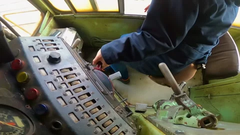 Train driver during ride of diesel electric locomotive EMD G16 in Banja Luka. Stock Footage 237632564