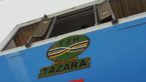 The train driver looks out from the cab train Station.DaresSalaam Tanzania Stock Footage 131448753