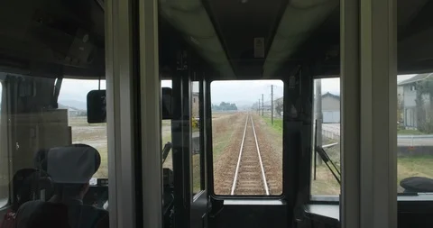 Train driver pov, driving forward facing view from train in Japan. Railroad Stock Footage 124318962