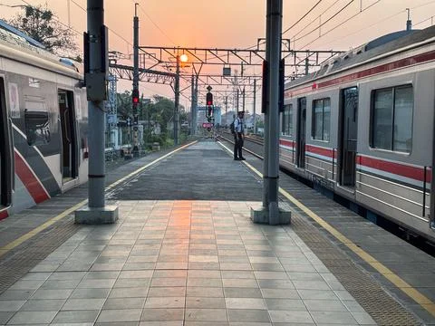 Train Driver Talking with Colleagues Before Commuter Train Departure in Bekas Stock Photos