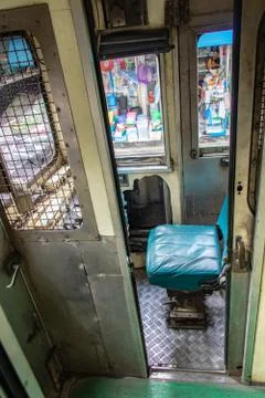 The train driver's cab in the old train standing at railway station. Stock Photos