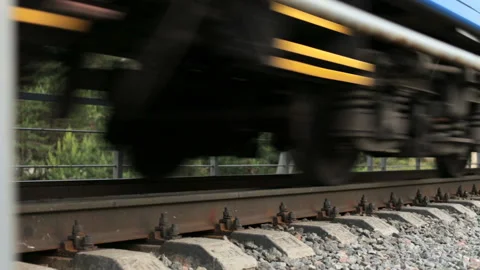 The train drives across the bridge Stock Footage 90339893