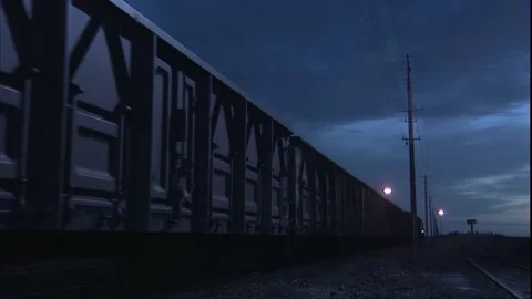 The train drives away at night Stock Footage 249506325