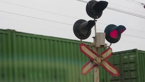 The train drives past a red semaphore Stock Footage 82951795