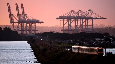 Train Driving into the Sunset Stock Footage 123694195