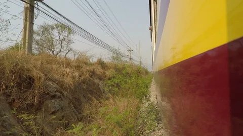 Train Driving Through Counryside Exterior POV Stock Footage 127598792