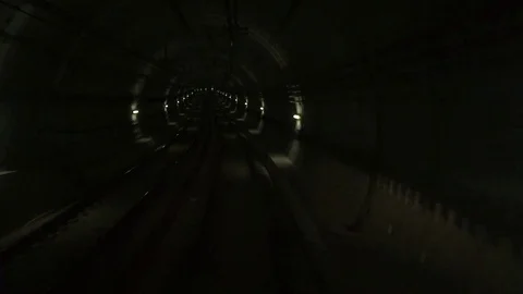 Train driving in an underground tunnel Stock Footage 71770716