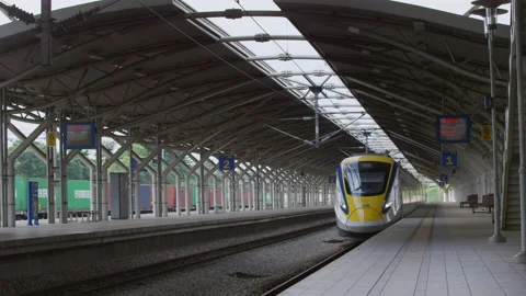 The train drove into an empty railway station, Malaysia Stock Footage 134741116