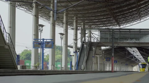 The train drove into a train station with no one, Malaysia Stock Footage 134742573