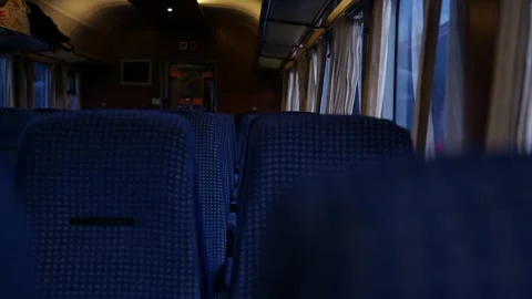 Train with empty seats or bench. Interior view of train. Stock-Footage 297183439