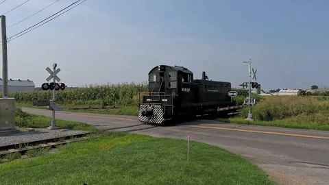 Train Engine Passing Amish Tobacco Harvest - Ronks, PA Stock Footage 342561078