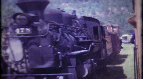 Train engineer hangs outside the caboose 1950s vintage film home movie 598 Stock Footage 32376887
