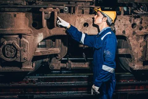 Train engineer team working service maintenance old dirty vintage classic s.. Foto stock