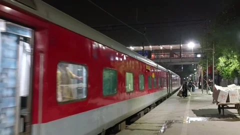 A Train entering the platform at New Delhi Railway station Stock Footage 340192942