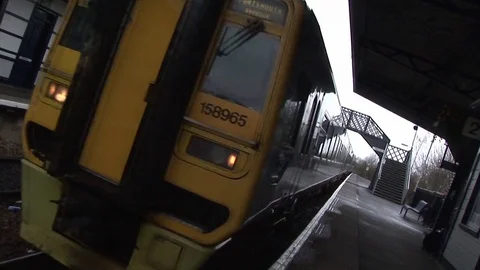 Train entering station. Video stock 79169911