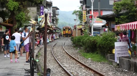 Train entering a station of Pingxi, Taiwan Stock Footage 63023613