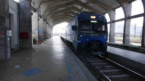Train Entering a Train Station 4K 60fps Stock Footage 192447986
