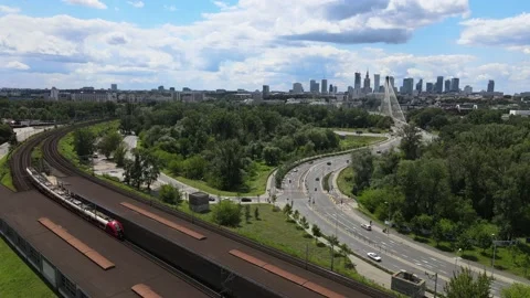 The train enters a small station Stock Footage 135136103