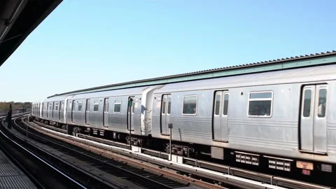 Train exiting Rockaway Boulevard. MTA train in Slow Motion (1) 스톡 동영상 132460233