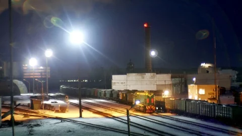 Train in factory at night Stock Footage 72875032