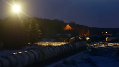 Train in factory at night 動画素材 72875054
