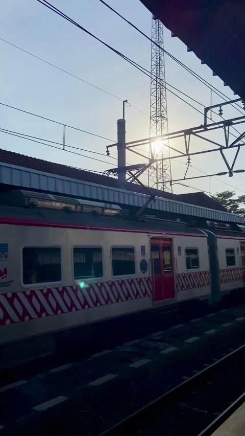 Train in fine weather passing through the station Stock-Footage 270009784