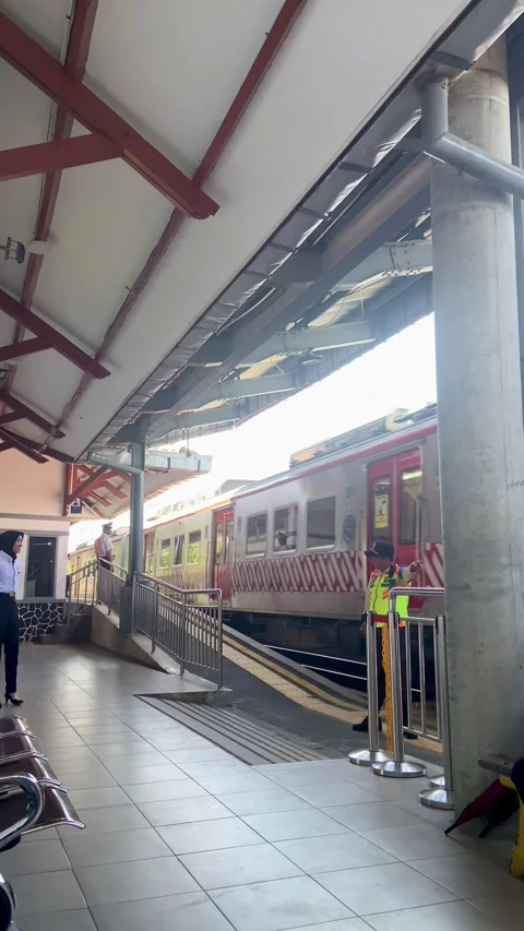 Train in fine weather passing through the station Stock-Footage 270009892
