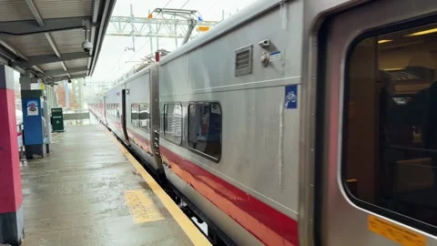 Train Full Of People Commuting Arriving On A Station Platform In Connecticut Stock Footage 338131052