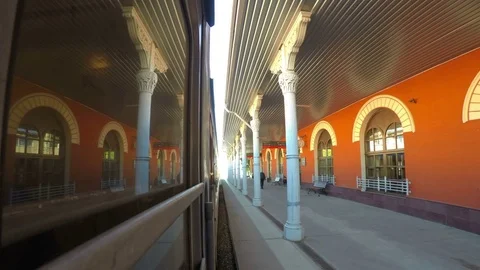 Train Goes After Stop on Sunny Day. Concept Good Mood. Railroad Car Door Closes Stock Footage 69866132