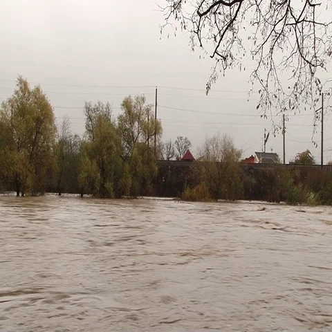 The train goes from a flowing river Stock Footage 69294633