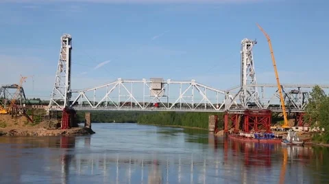 Train goes over the bridge on the river Svir. North of Russia Video stock 67820474