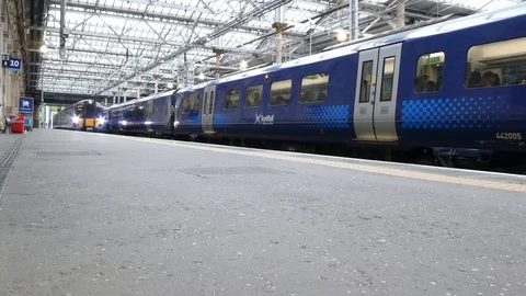 The train goes to the platform. Stock Footage 113230623