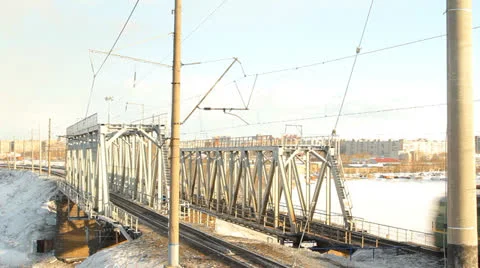 Train goes through railway bridge Stock Footage 22542759