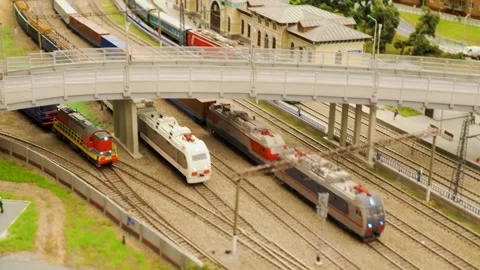 The train goes through the station - a model of the city and the railway Stock Footage 194858811