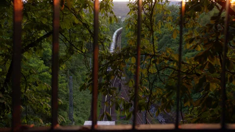 Train goes into the tunnel Stock-Footage 253872296