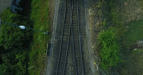 A train goes under the drone. Stock Footage 116655466