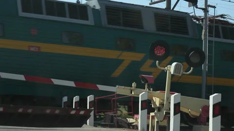 Train going across railroad railway signaled crossing Stock Footage 8538583