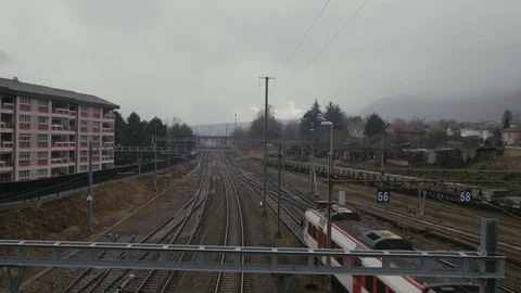 The train is going around the railway Stock Footage 78138635