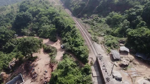 Train going in the forest drone shot 4k 30p Stock Footage 232331951