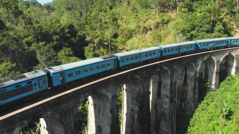 Train going on Nine Arches Bridge sri lanka aerial view Stock Footage 244682990