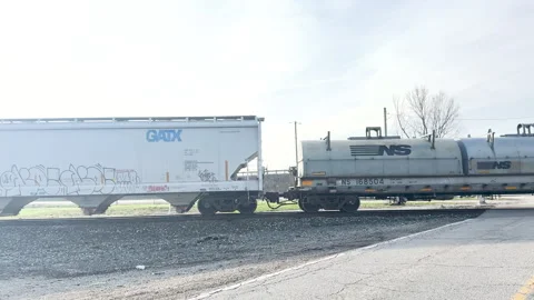 Train going by at railroad crossing blocking traffic in Enon 4k Stock Footage 332992484