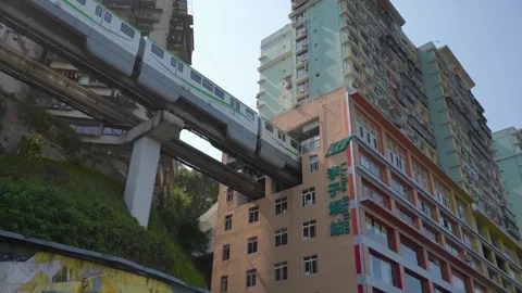 Train going through a building at Liziba Station. Stock Footage 292916711