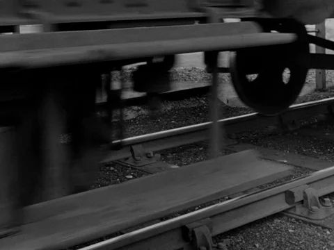 Train going through countryside and its crew operating engines, UK 1955 Stock-Footage 133270719