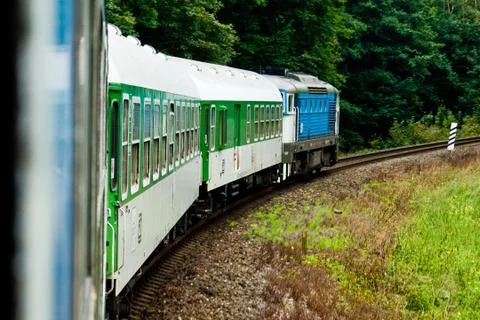 Train going through Countryside Stock Photos